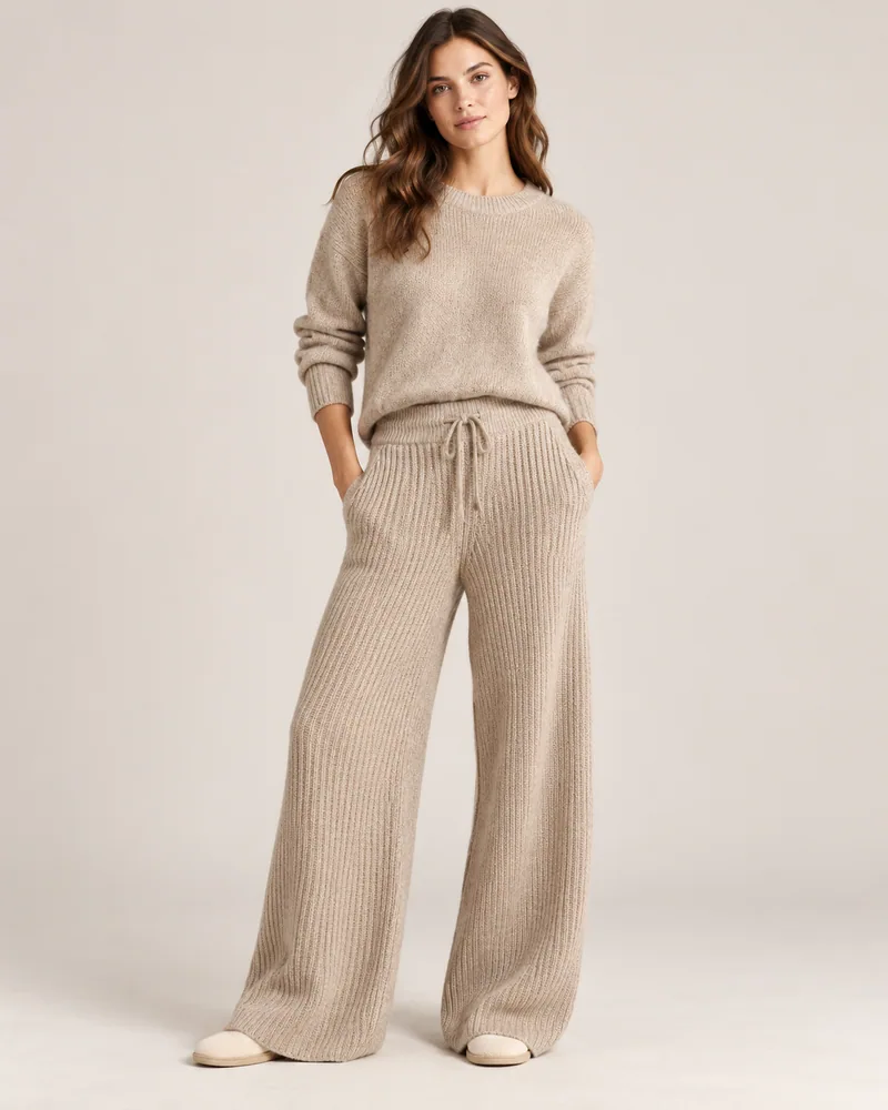 Beige wide-leg knit pants with a drawstring waist